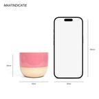 Maatindicatie van het roze koffiekopje: 6 cm hoog en 7 cm breed